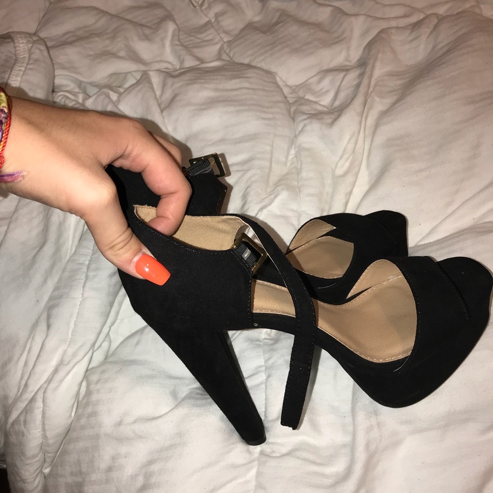 Really tall black pumps